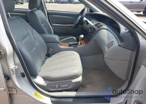 2003 Toyota Avalon Xls z USA, uszkodzony, nr VIN 4T1BF28B23U276553